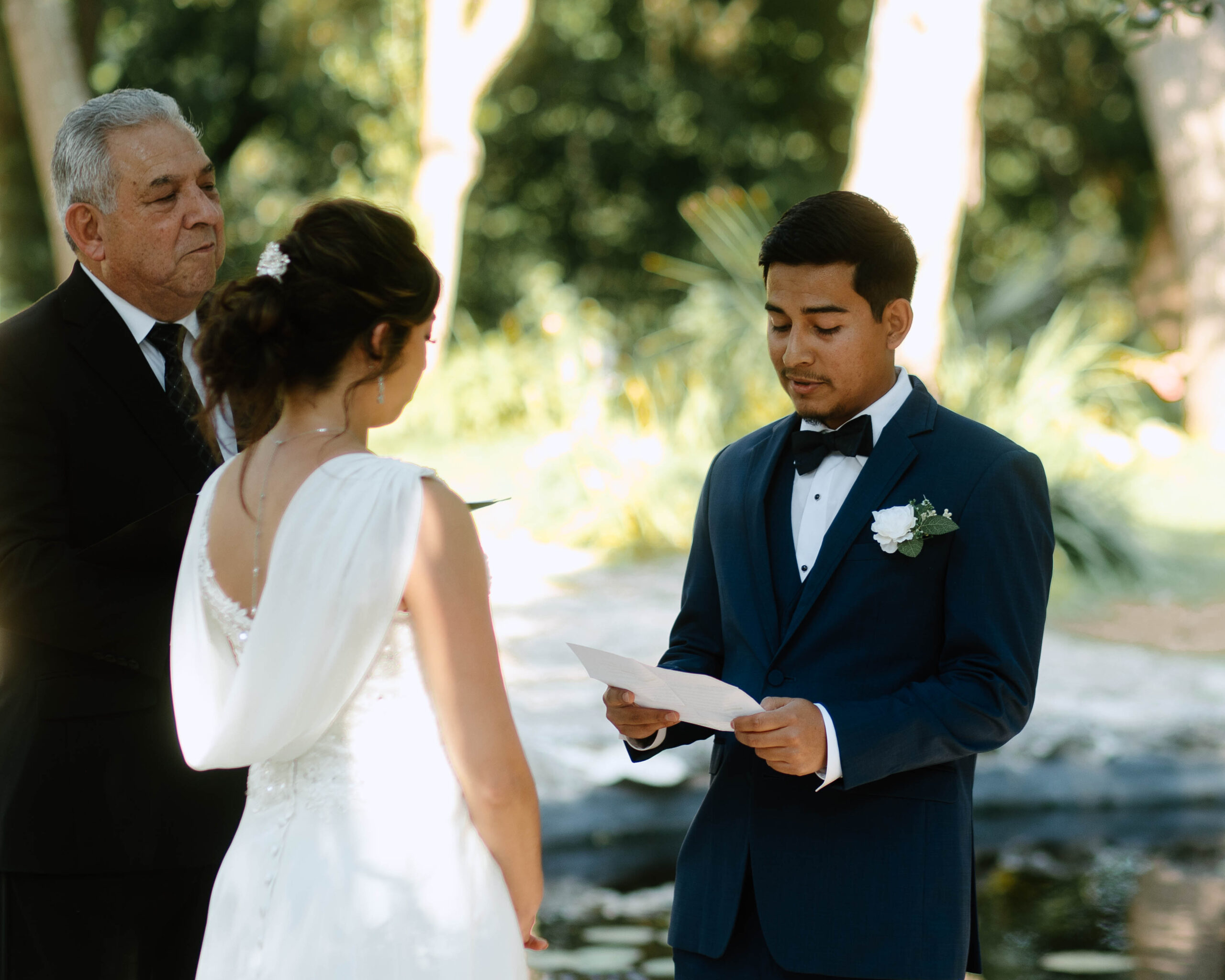 Ceremony Wedding Photography at Mayfield Gardens. Photograph by Bare Moments Photography. Taken during the summer in Austin, Texas. 