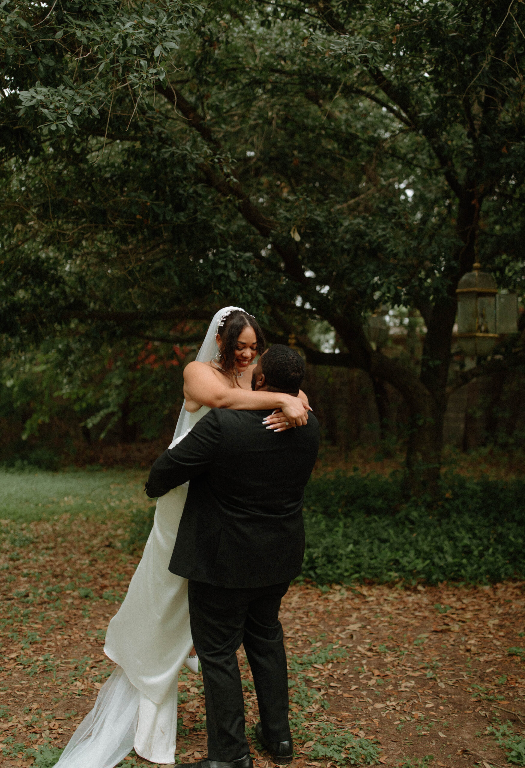 a wedding couple dancing under the Chandelier tree at Sekrit Theater. 