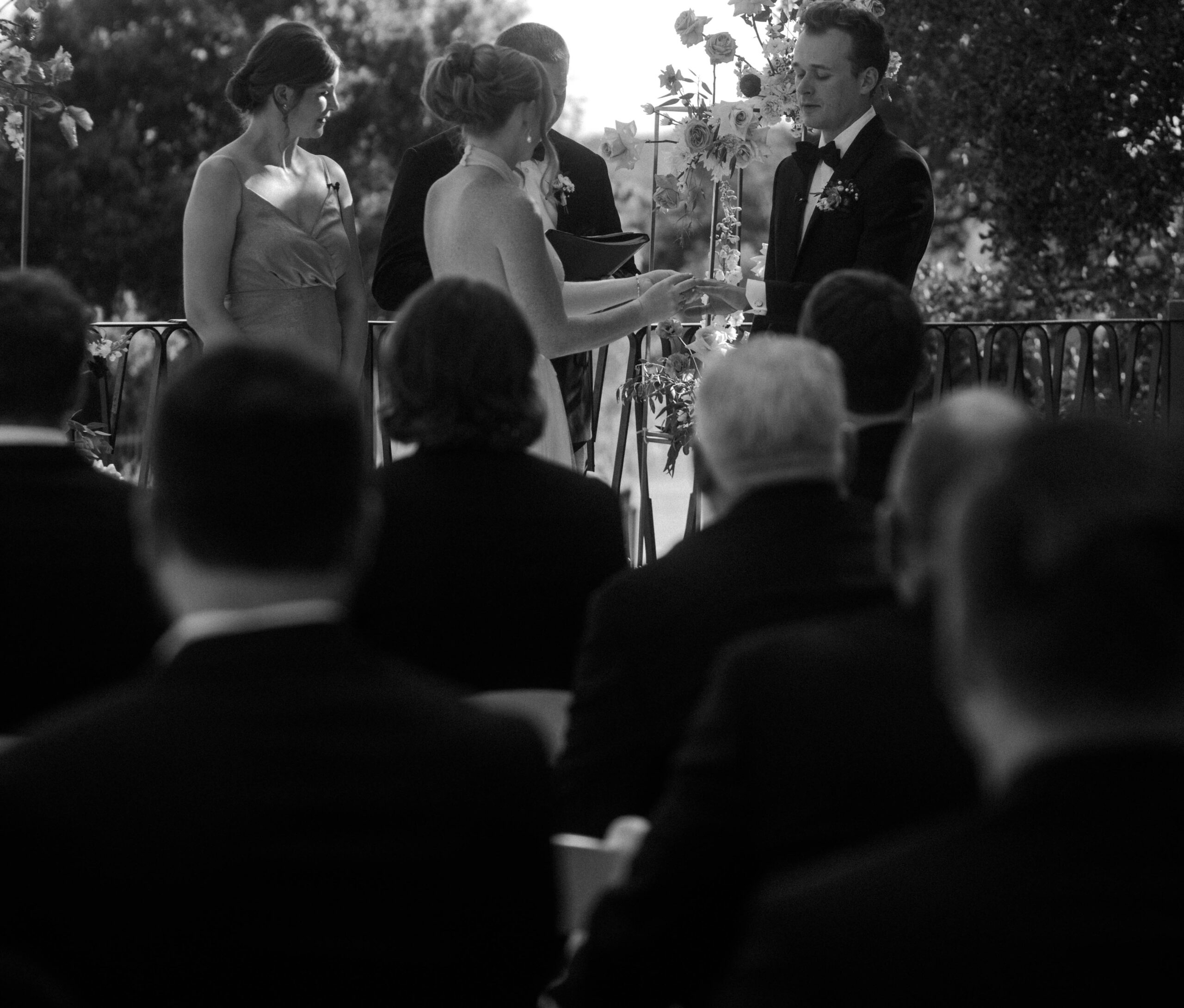black and white image of a wedding ceremony in the courtyard at Villa Antonia Wedding Venue.