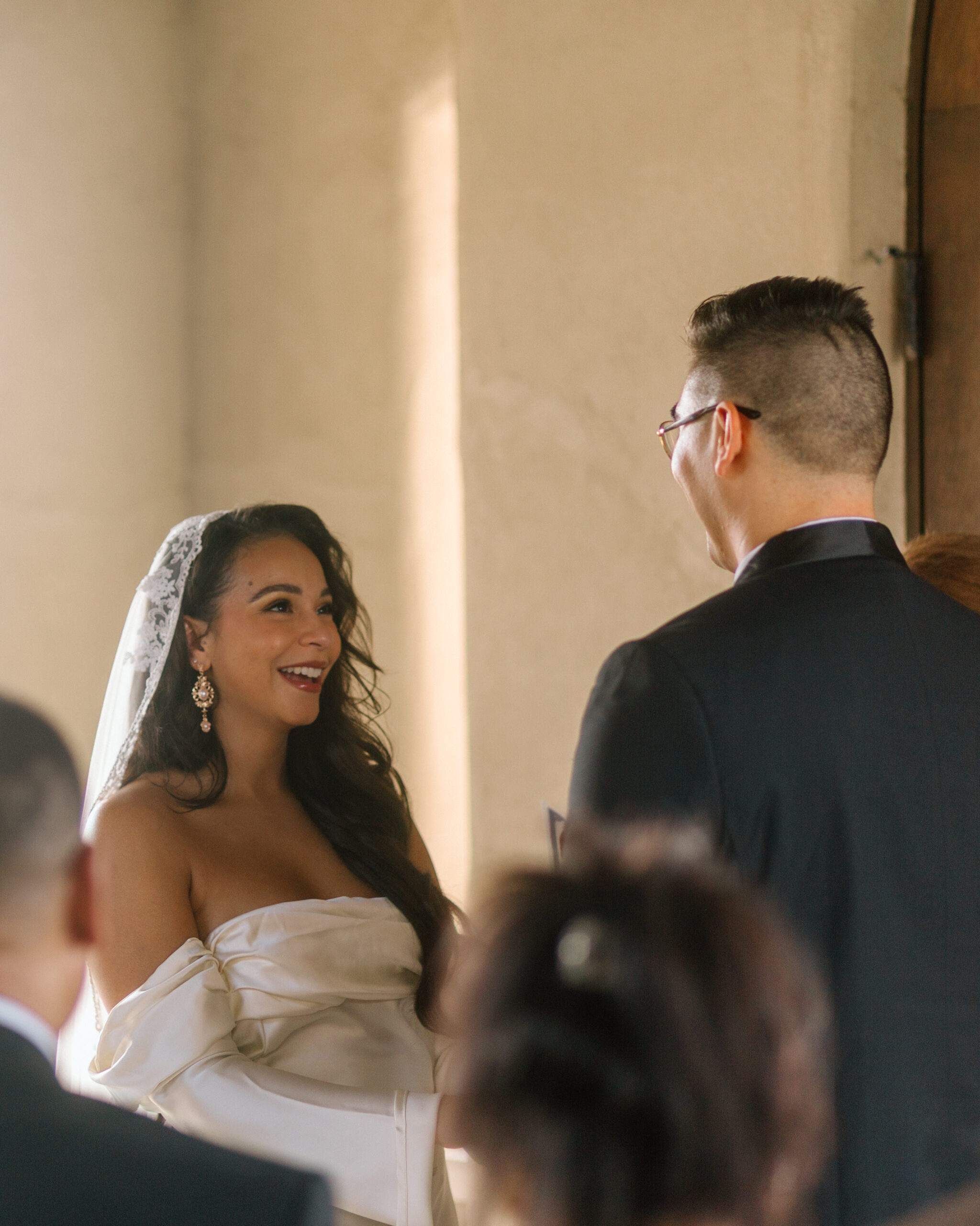 couple reading this vows during the Texas wedding ceremony at Chapel Dulcinea.